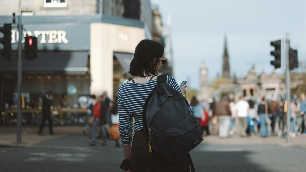 Person from behind in Edinburgh's George Street